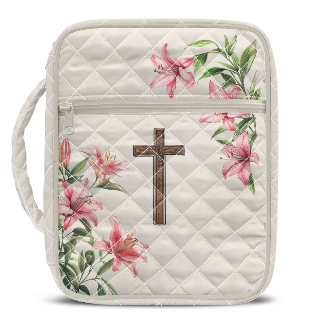 White quilted Bible case with pink lilies and a cross.