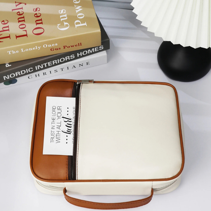 Faithful Sand Quiet Faith Bible Case displayed in a softly lit home setting beside a lamp